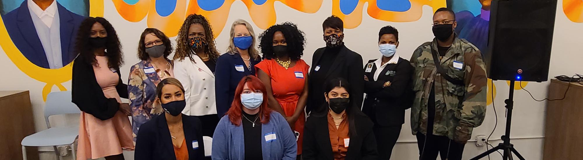 Group of 2021 Changemakers in front of wall at the Blake Annex
