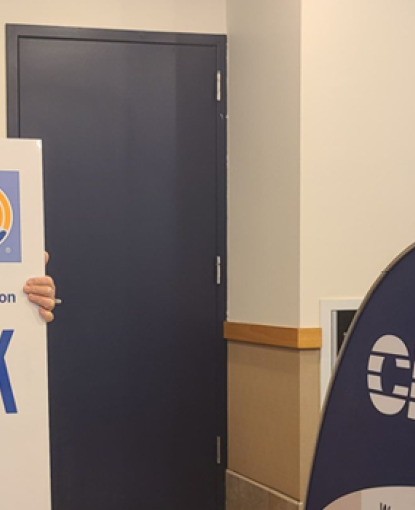 Carm Basile, CDTA CEO holding Thank You Sign