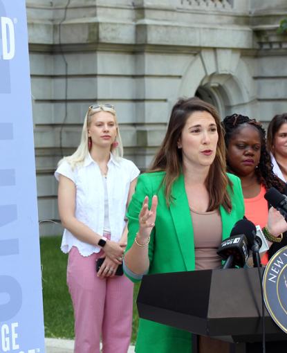Sen. Hinchey at Podium on Women United Advocacy Day